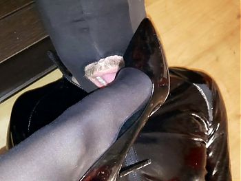 Slave licks Mistresss shoes                